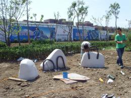 hj1736 石雕—箱包_青島國(guó)際服裝城不銹鋼雕塑、石雕、玻璃鋼雕塑_濱州宏景雕塑有限公司